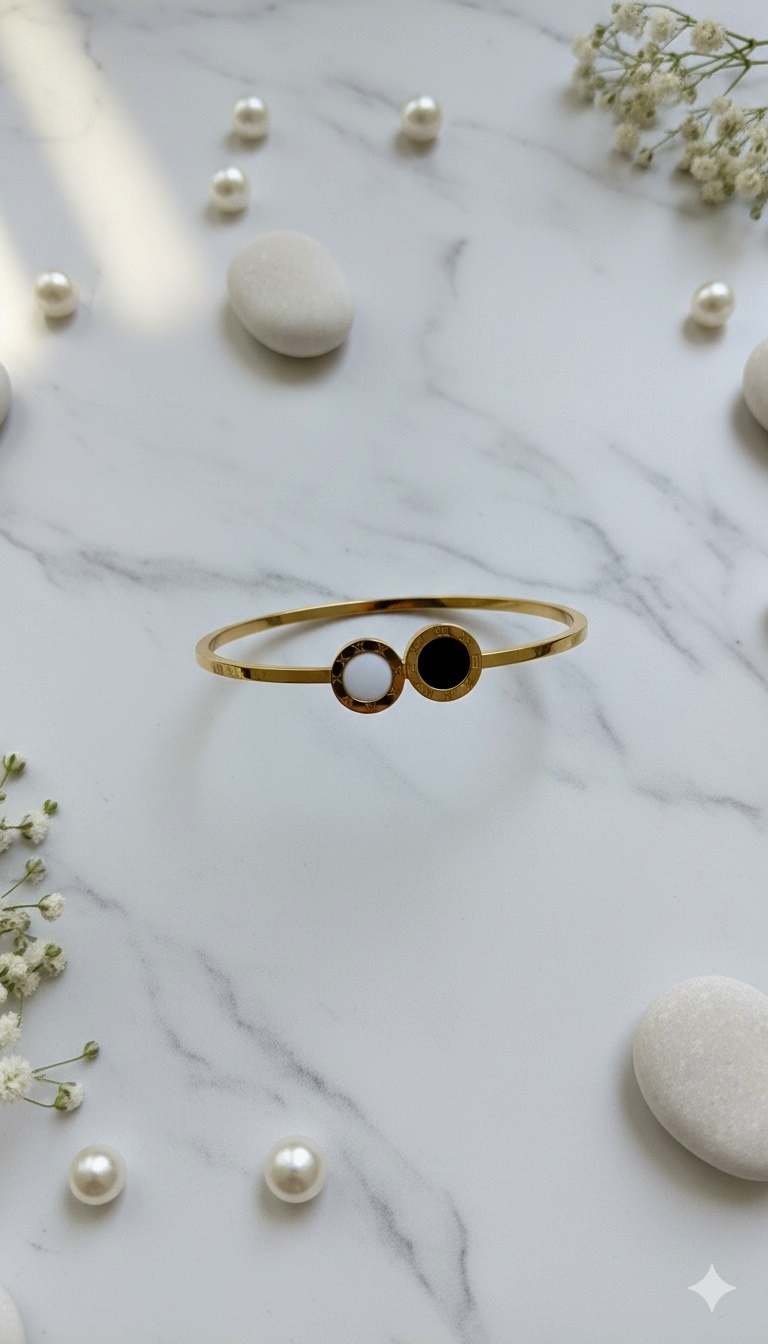 elegant dual tone roman dial cuff bracelet – gold plated with black & white accents elegant dual tone roman dial cuff bracelet – gold plated with black & white accents